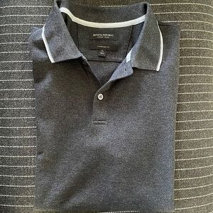 Banana Republic gray polo with white trim on collar and arm sleeve. Worn twice.
